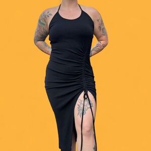 NWT HALARA size M bodycon halter dress. Backless. halter and drawstring slit.